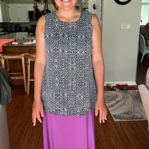 Finger tip two layer dress top. Size Small. Black and white print with layers